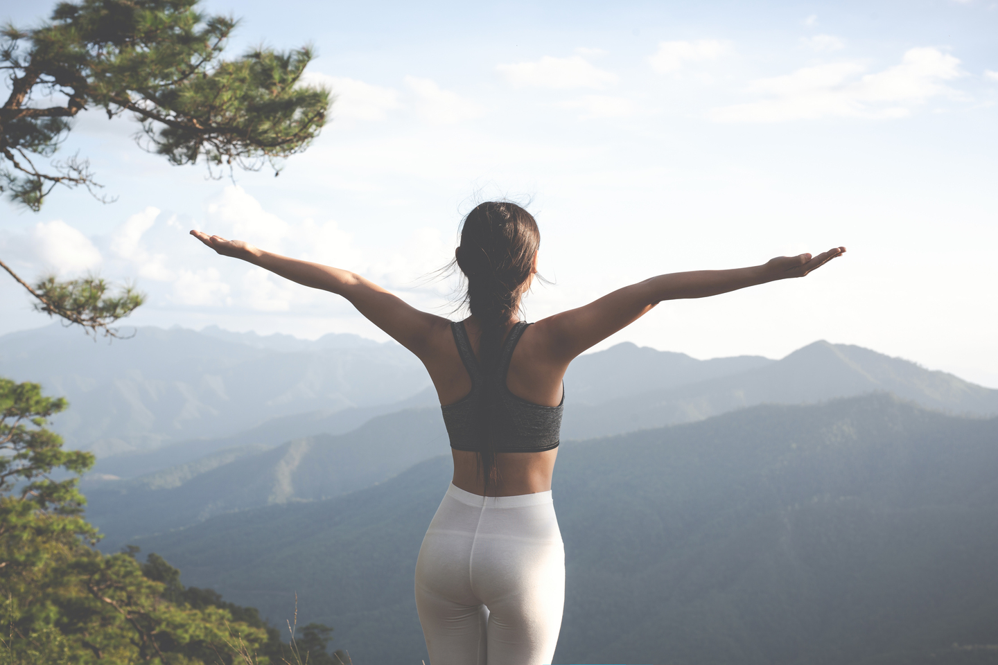 Woman enjoying calm morning sunlight